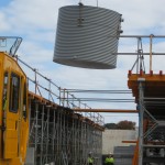 10,000 Litre Steel Rainwater Tank being craned into position on a commercial site